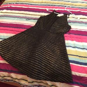 Brand new, never worn black and gold dress